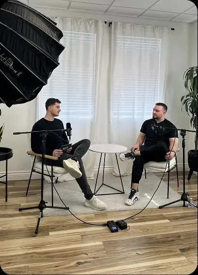 Podcast-style brand interview setup with light dome and microphones