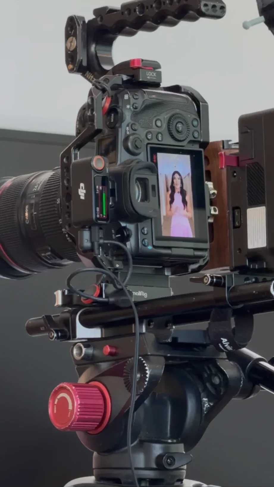 Cinema camera rig framing talent on the monitor