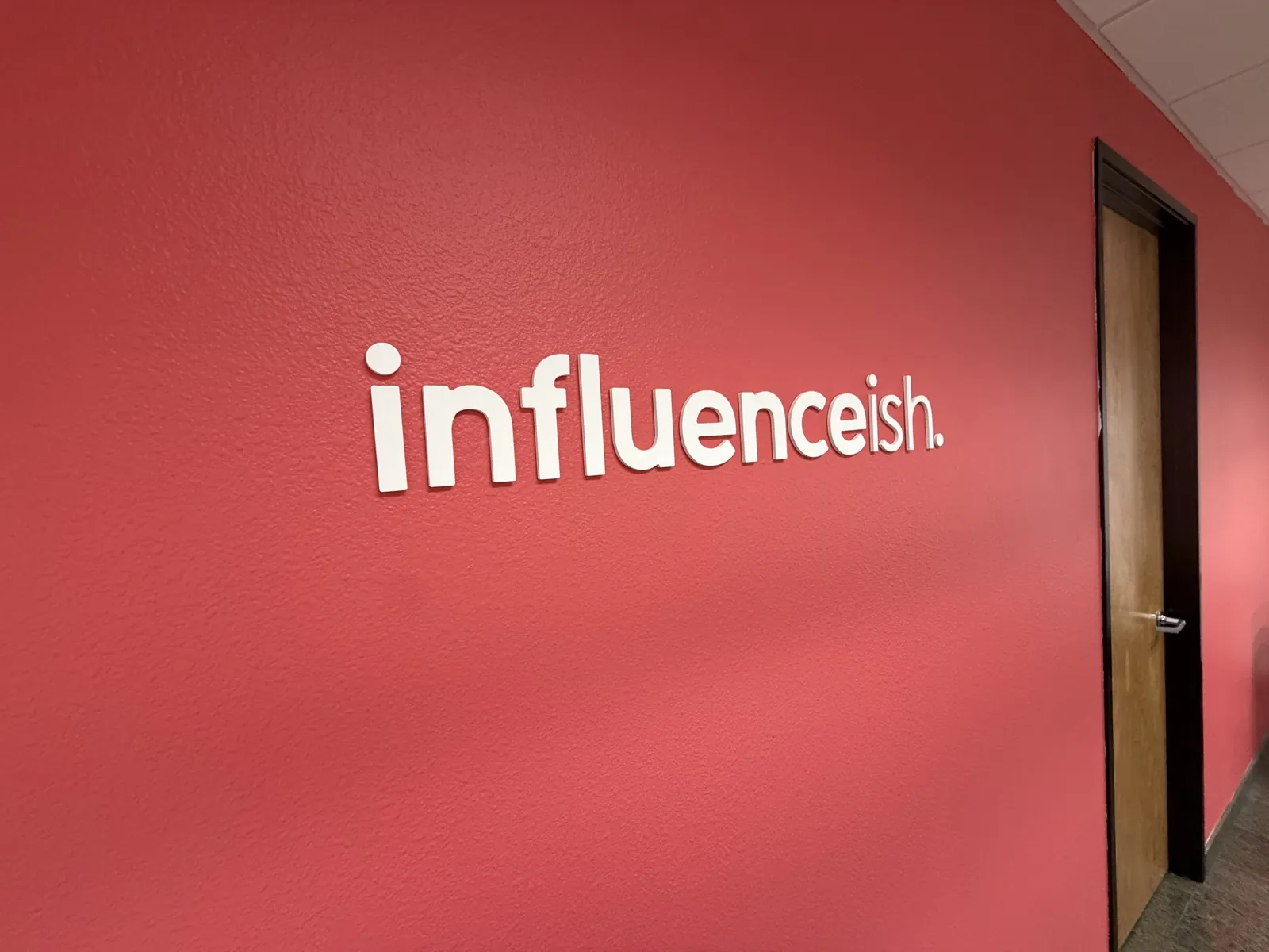 The Influenceish office — brand wall in North County San Diego